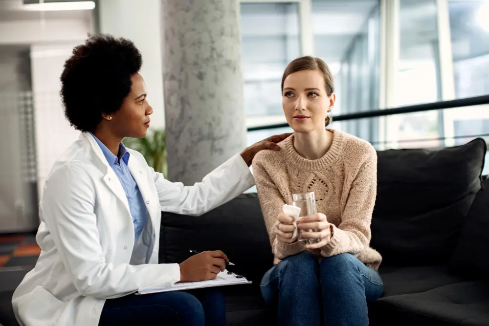 Patient talking with a primary care doctor for anxiety and depression at a Richmond TX clinic